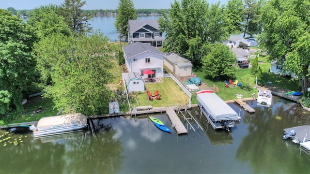 aerial view with a residential view and a water view