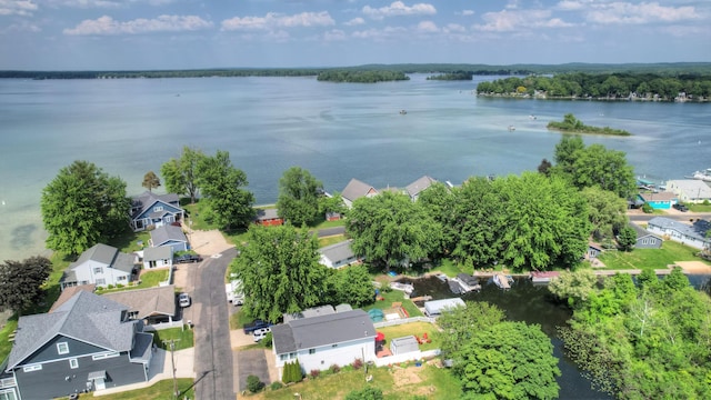 aerial view with a water view and a residential view