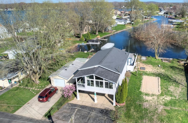 drone / aerial view with a water view