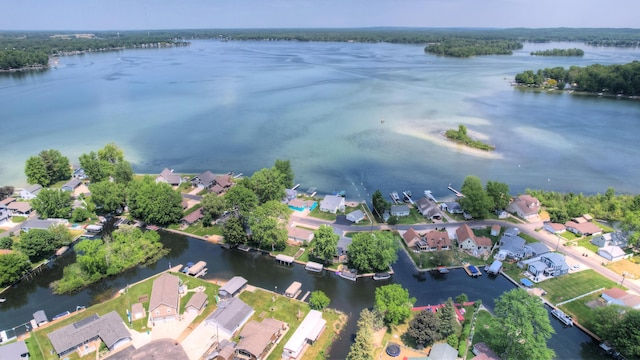 bird's eye view featuring a residential view and a water view