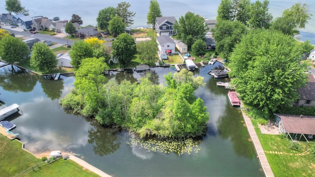 aerial view with a water view and a residential view