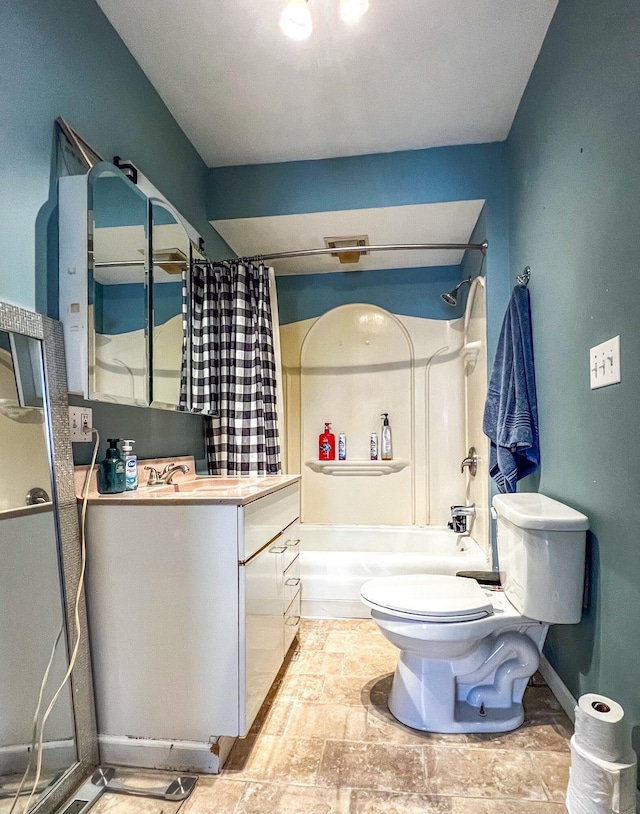 full bath with shower / tub combo, vanity, toilet, and baseboards