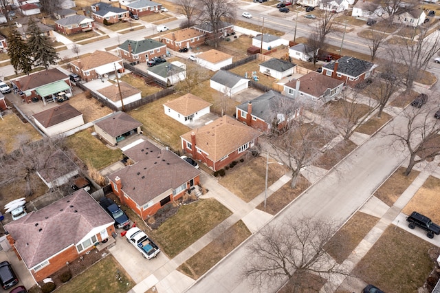 birds eye view of property with a residential view