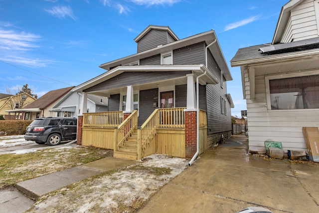 traditional style home with covered porch