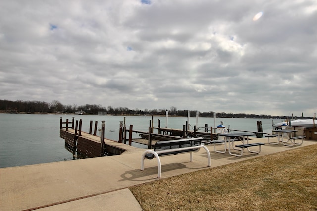 dock area with a water view