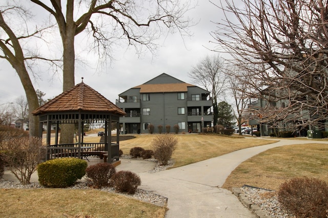 view of community with a yard and a gazebo