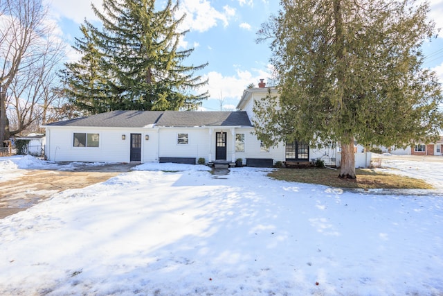 view of front of home with a chimney