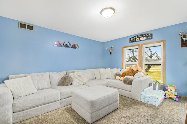 carpeted living room featuring visible vents