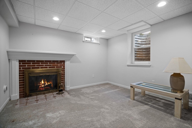 sitting room with a fireplace, baseboards, carpet flooring, and recessed lighting