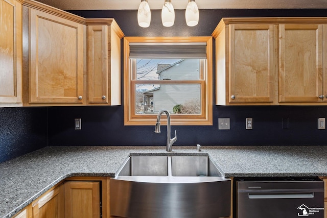 kitchen featuring a sink and dishwasher