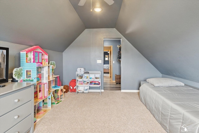 bedroom with lofted ceiling, baseboards, a ceiling fan, and carpet flooring