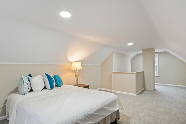2205 Hanford Ave, Lincoln Park, MI 48146 - bedroom featuring lofted ceiling, baseboards, and light colored carpet