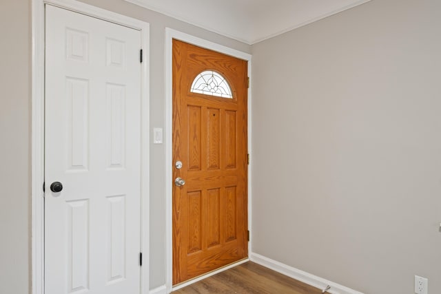 entrance foyer with wood finished floors and baseboards