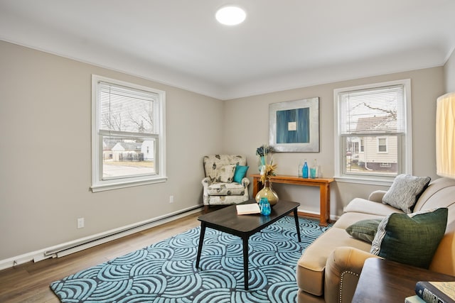 2205 Hanford Ave, Lincoln Park, MI 48146 - living area with healthy amount of natural light, baseboard heating, wood finished floors, and ornamental molding