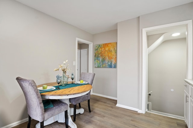 2205 Hanford Ave, Lincoln Park, MI 48146 - dining area with light wood finished floors and baseboards