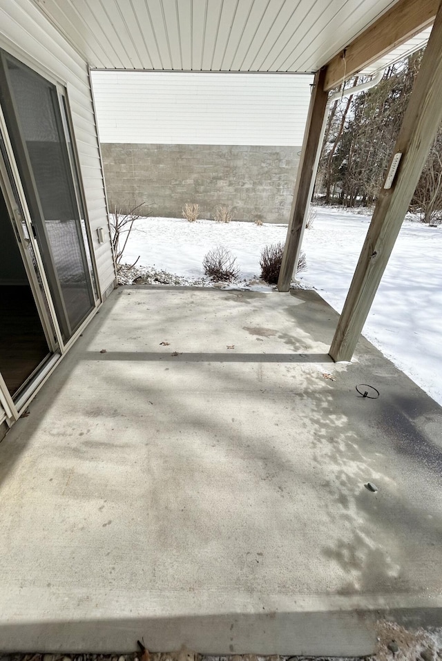 view of snow covered patio