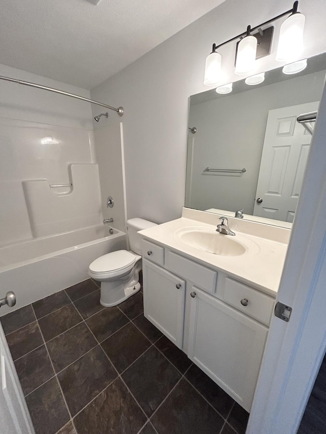 full bathroom featuring shower / bathing tub combination, vanity, toilet, and tile patterned floors