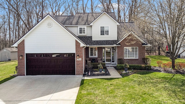 traditional home featuring concrete driveway, brick siding, a front lawn, and roof with shingles