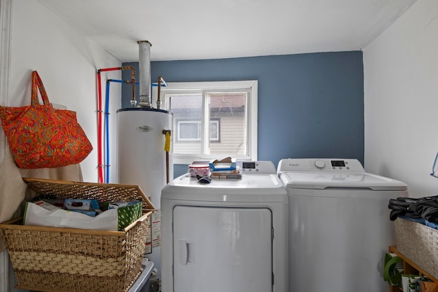 laundry room featuring washer and dryer, laundry area, and water heater