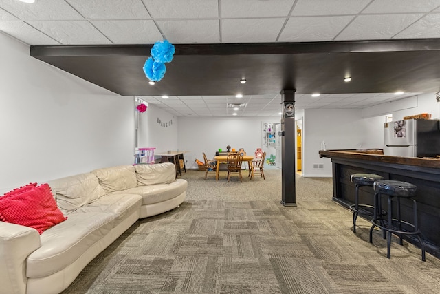 game room with carpet floors, a paneled ceiling, recessed lighting, visible vents, and a bar