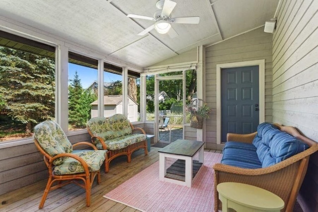 sunroom with vaulted ceiling and ceiling fan