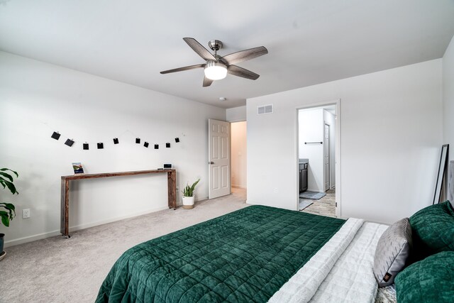 bedroom featuring baseboards, visible vents, ceiling fan, and light colored carpet