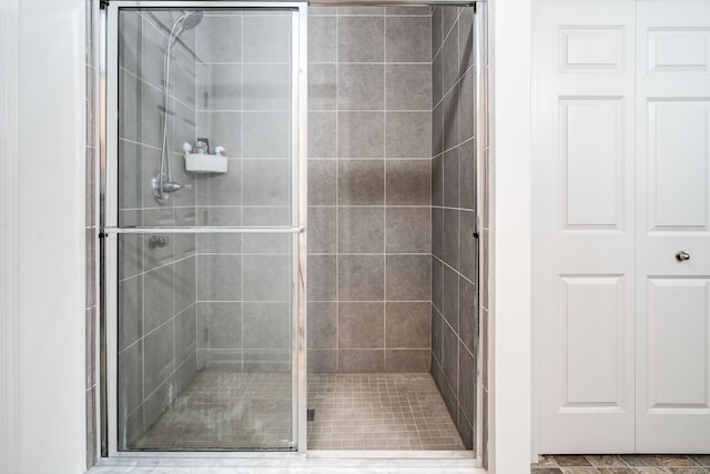 bathroom featuring a stall shower