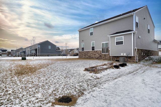 view of snow covered property