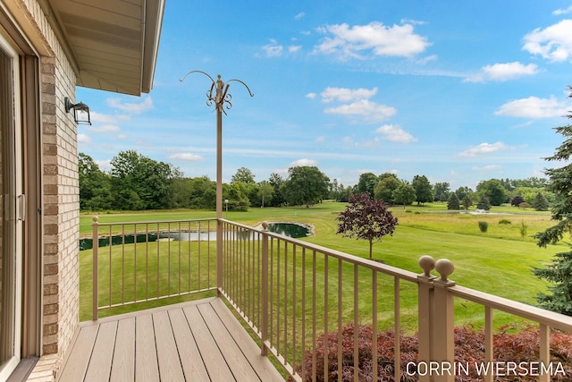 deck featuring a lawn