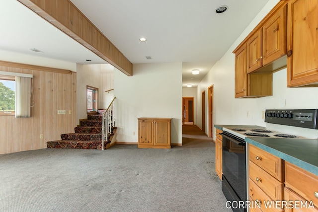 kitchen with black range with electric cooktop, recessed lighting, light colored carpet, visible vents, and brown cabinetry