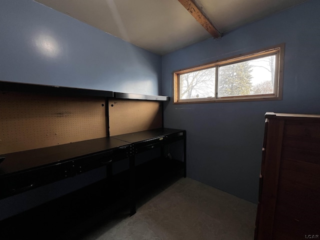 bedroom featuring beam ceiling