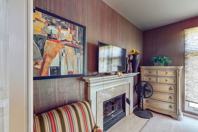 sitting room with carpet floors and a fireplace