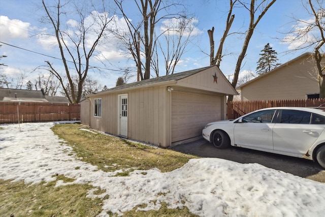 detached garage with fence