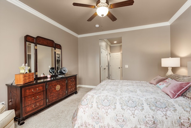 bedroom with light carpet, crown molding, a ceiling fan, and baseboards