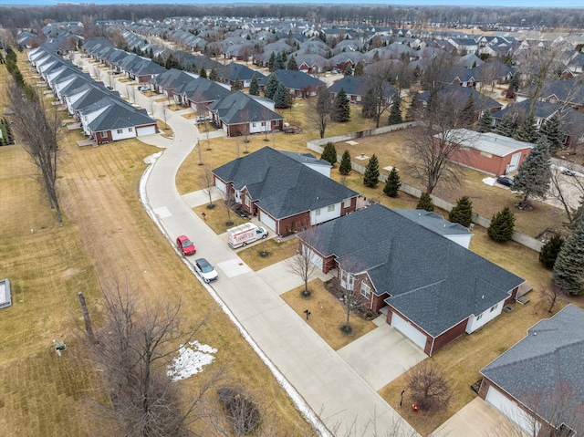 birds eye view of property with a residential view