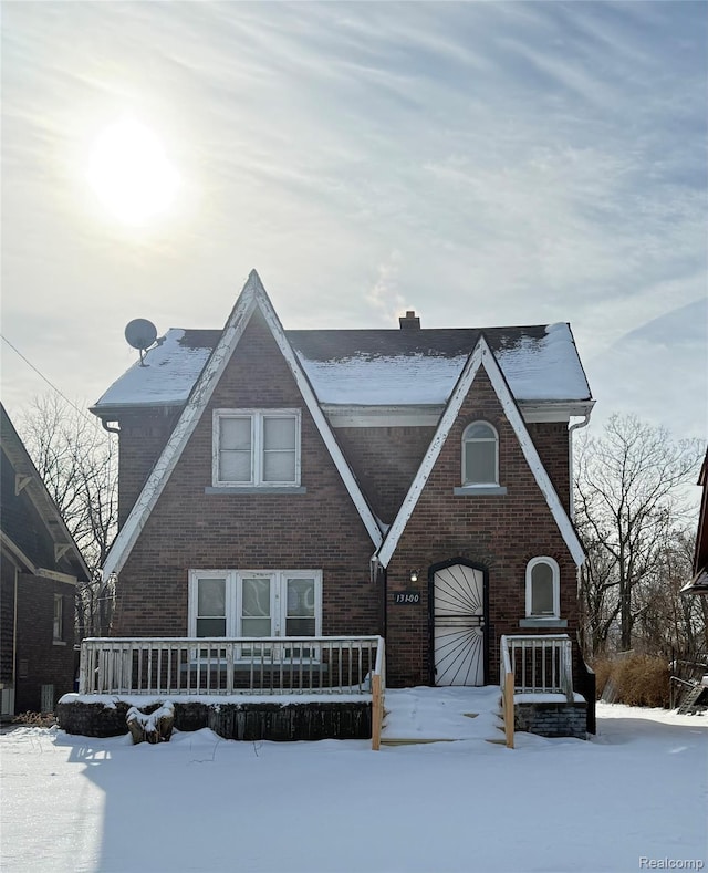 13100 Wilshire Dr, Detroit, MI 48213 - tudor home featuring brick siding and an attached garage