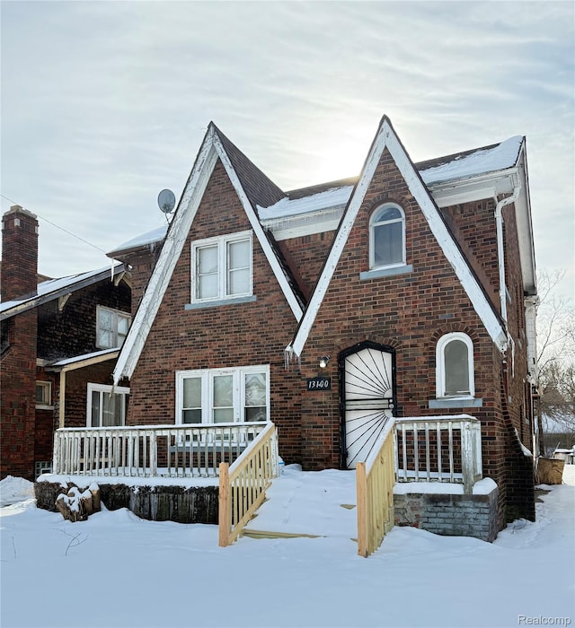 13100 Wilshire Dr, Detroit, MI 48213 - tudor-style house featuring brick siding