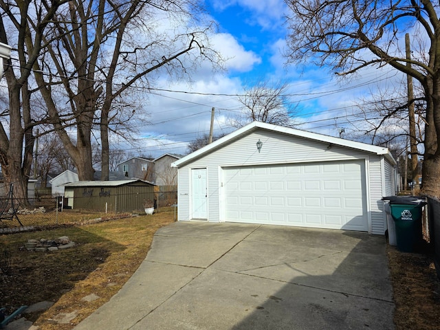 detached garage with fence