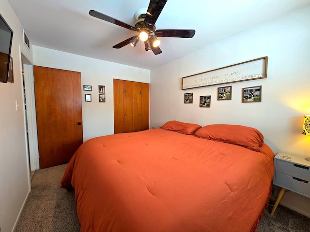 bedroom with ceiling fan, carpet floors, a closet, and visible vents