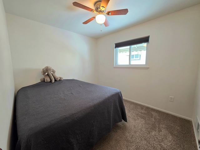 bedroom featuring carpet, ceiling fan, and baseboards