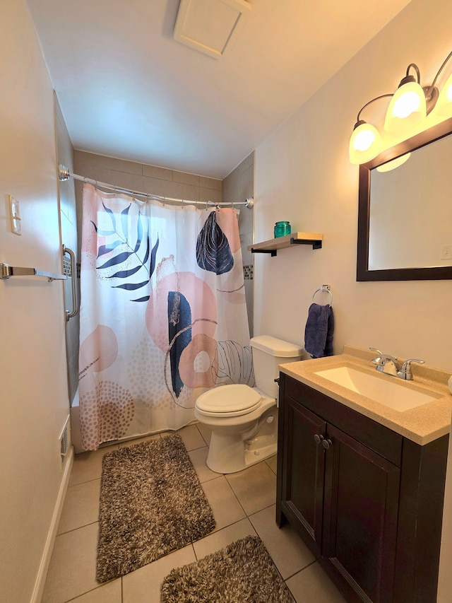 full bath with visible vents, vanity, toilet, and tile patterned floors