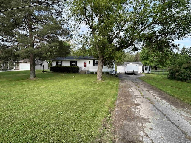 6455 Turner Rd, Flushing, MI 48433 - manufactured / mobile home featuring asphalt driveway