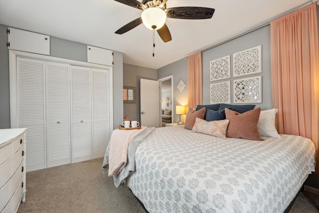 bedroom with ceiling fan, a closet, and carpet