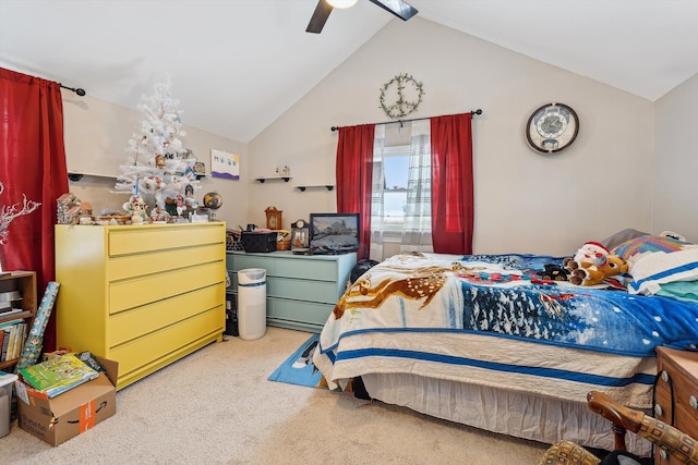 carpeted bedroom with lofted ceiling and a ceiling fan