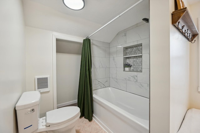 full bath featuring shower / bath combo with shower curtain and toilet