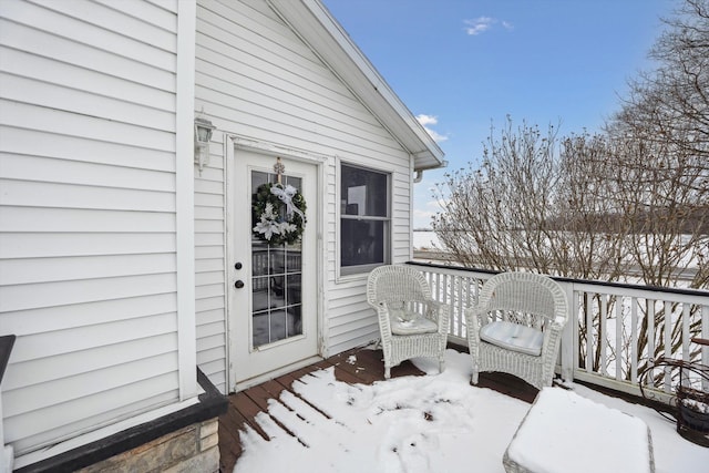 view of snow covered deck