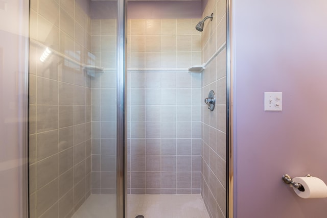 bathroom with a stall shower