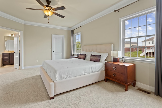 bedroom featuring light colored carpet, crown molding, visible vents, and baseboards