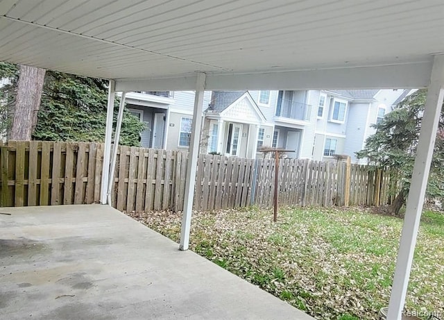 view of patio / terrace featuring fence