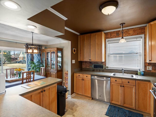 kitchen with a sink, a chandelier, dishwasher, and hanging light fixtures